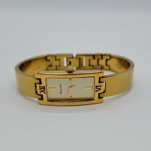 Bulova Watch Women Gold Tone Champagne Dial 15mm Rectangle 97T46